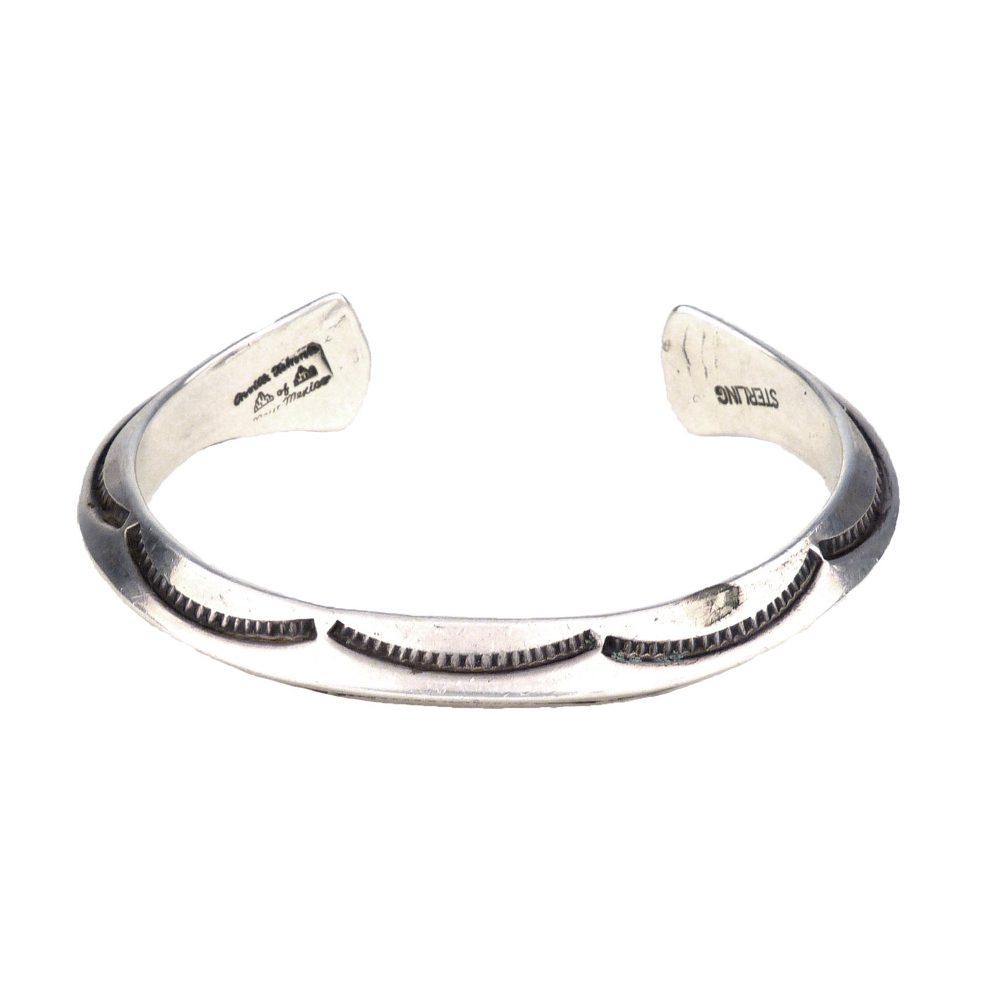Orville Tsinnie, Navajo Stamped Silver Carinated Bracelet 